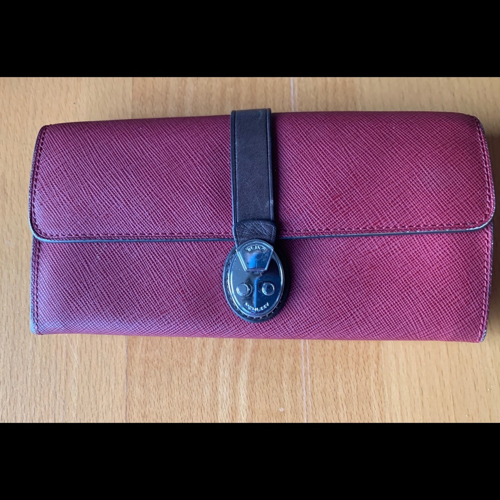Purple Tumi Wallet